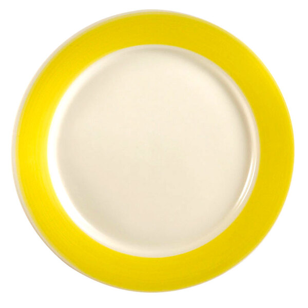 A CAC Rainbow yellow plate with a white rim.