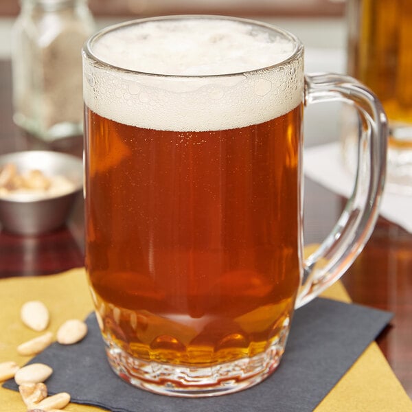 A Libbey glass mug filled with beer.