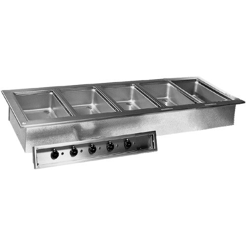 A Delfield drop-in hot food well with stainless steel pans in a school kitchen counter.