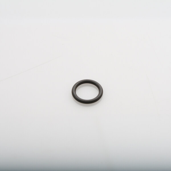 A black round Vulcan O-ring on a white surface.