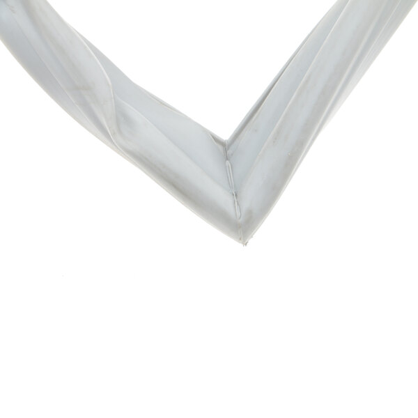 A close-up of a white plastic corner on a Norlake door gasket.