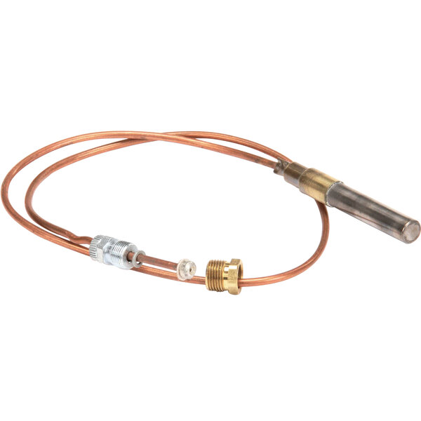 A copper wire with a brass connector attached to a metal tube.