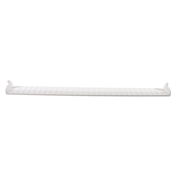 A white plastic Manitowoc Ice damper assembly shelf.