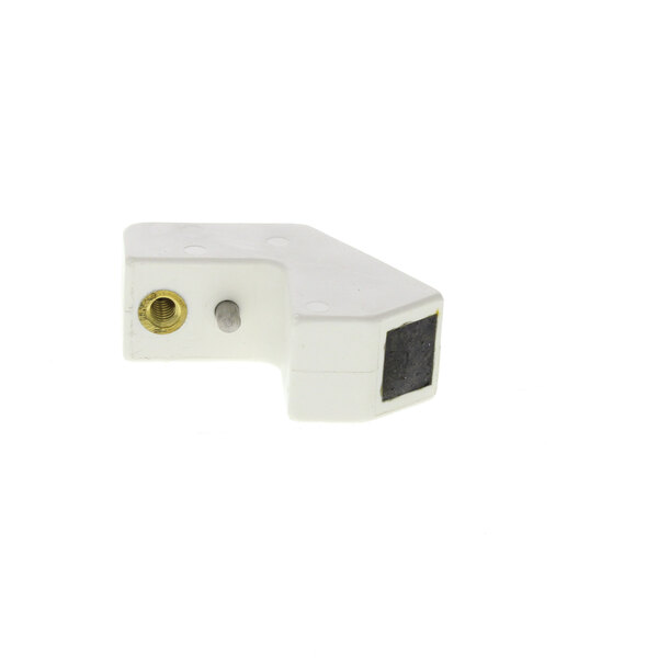 A white plastic corner connector with a black screw.
