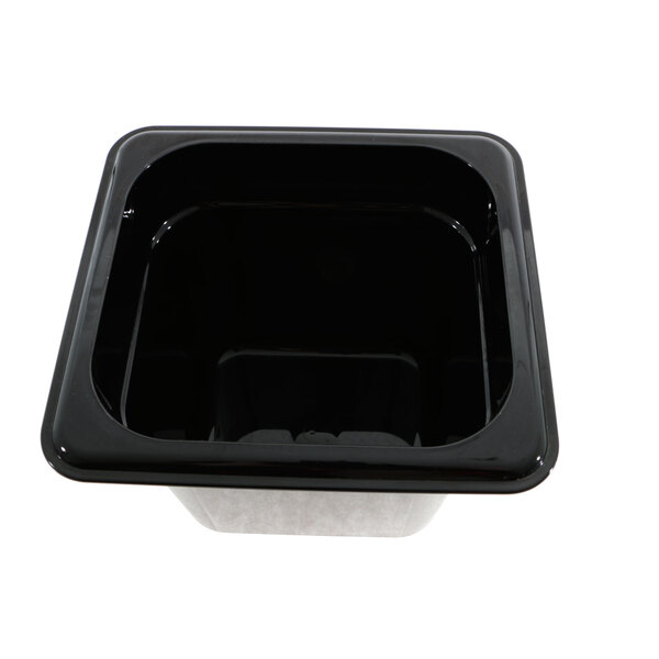 A black square container with a black lid.