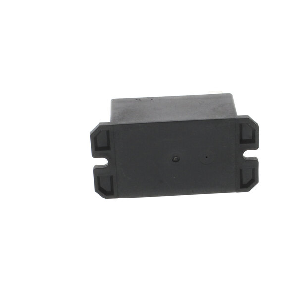 A black rectangular Heatcraft relay with holes in it.