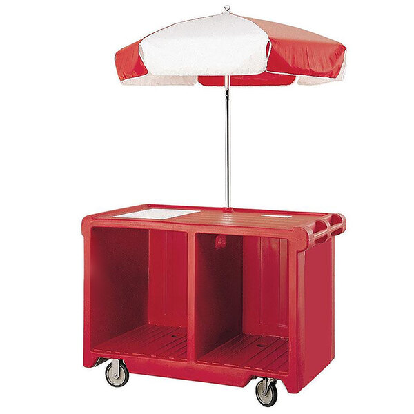A red Cambro vending cart with a white and red umbrella on top.