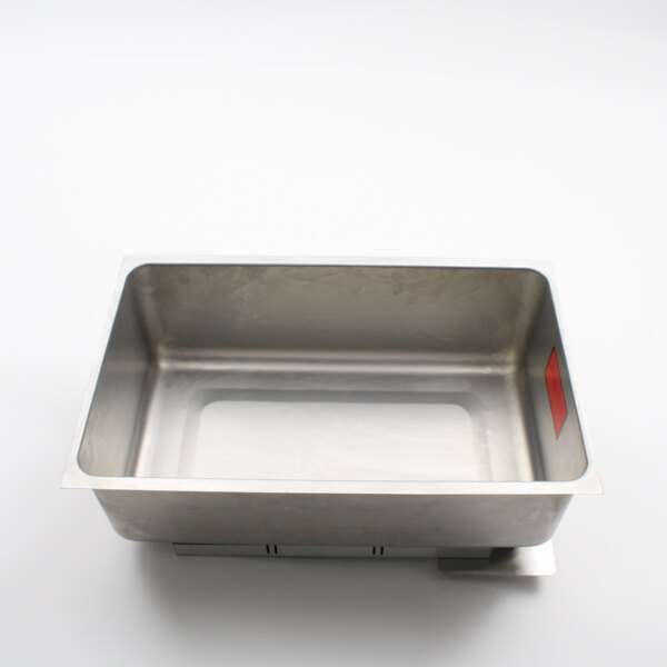 A Duke stainless steel sealed well pan on a white countertop.