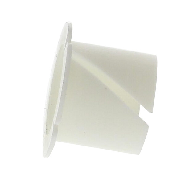 A white plastic bushing with a hole.