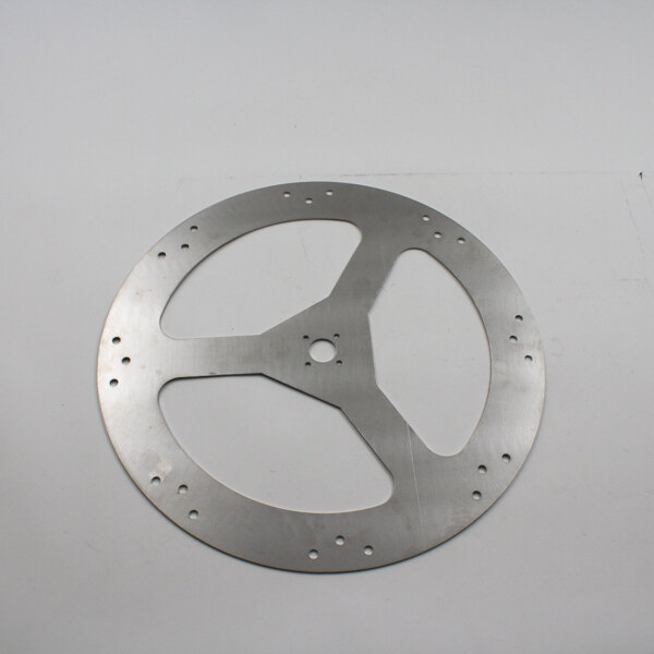 A metal circular disc with holes.