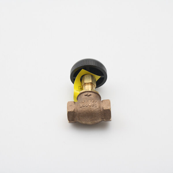 A Legion brass valve with a yellow cap on it.