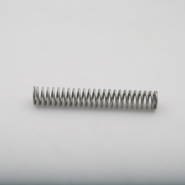 A Legion metal spring on a white surface.