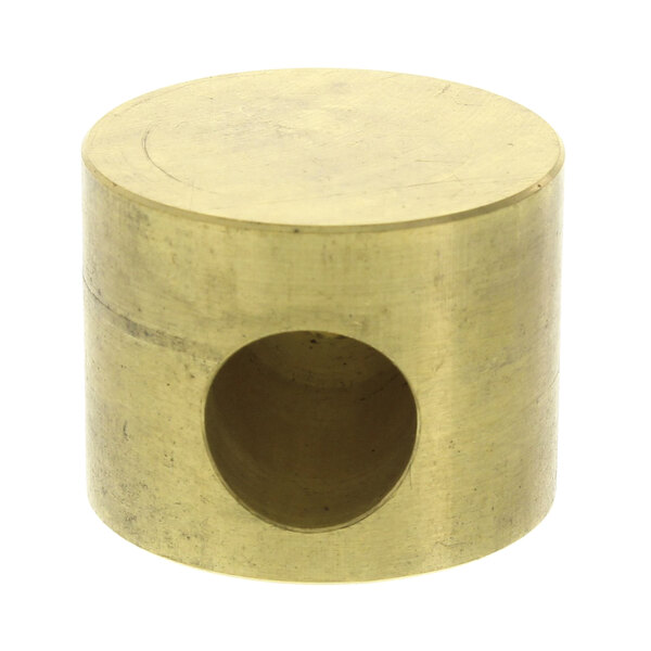 A gold cylinder with a hole in the center.