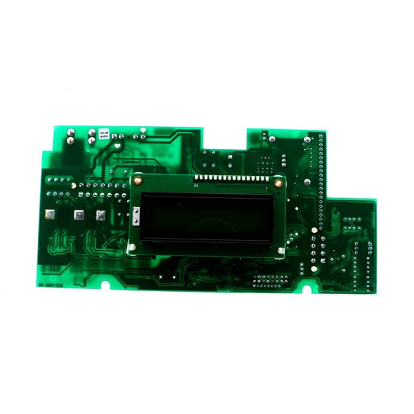 A green circuit board with a black rectangular object.