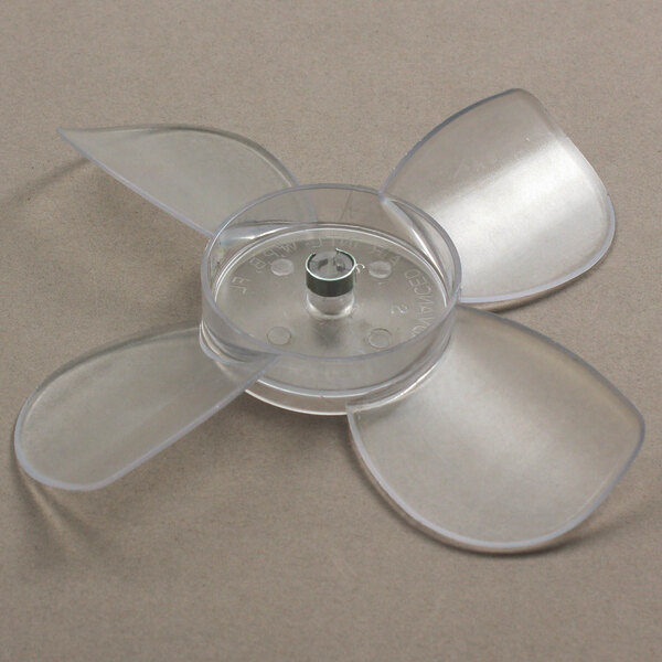 A plastic propeller with three blades.