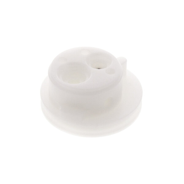 A white plastic Taylor Company Cap-Valve with holes.