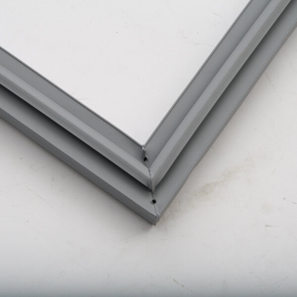 A close-up of a grey metal Gasket frame.