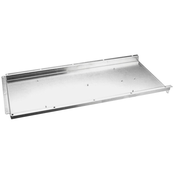 A metal tray with screws.