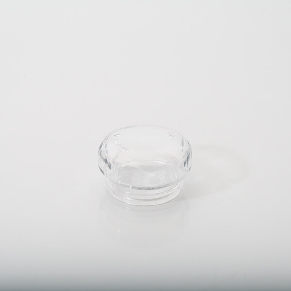 A clear glass cover with a round top.