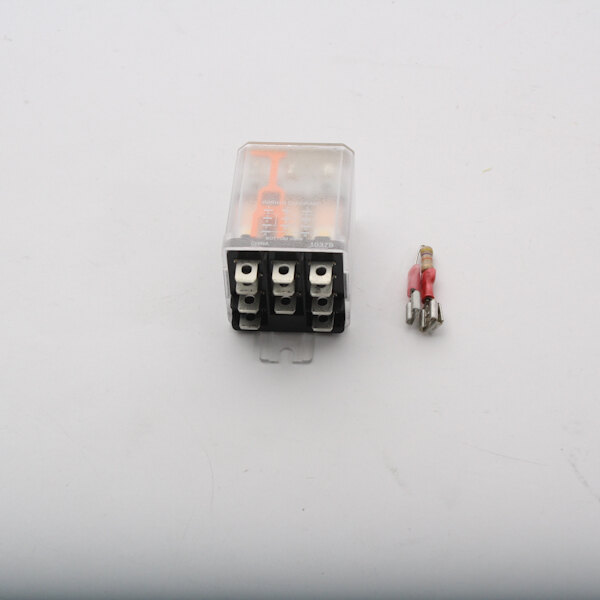 A small white and red Cres Cor relay with a small wire connector.