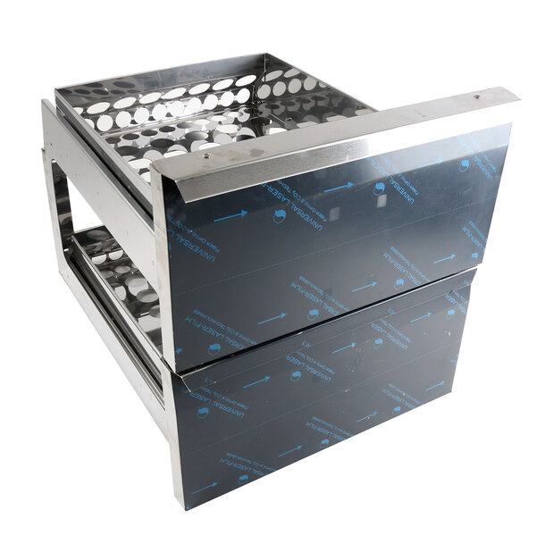 A stainless steel drawer frame cage for a Continental Refrigerator on a metal tray.