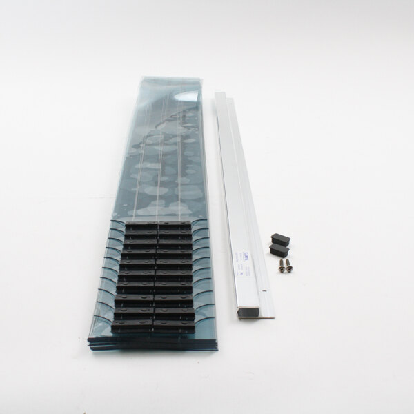 A Master-Bilt Easimount strip curtain with plastic and metal components.