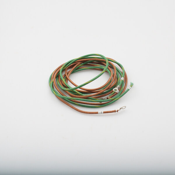 A close-up of a green and brown wire set with white connectors.