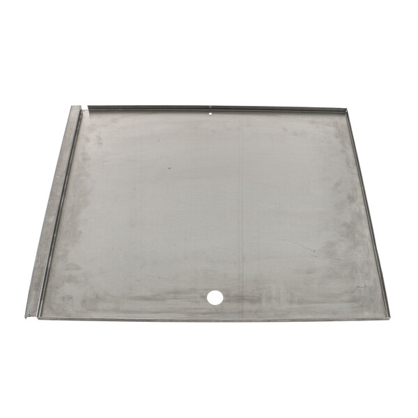 A rectangular metal tray with a hole in the middle.