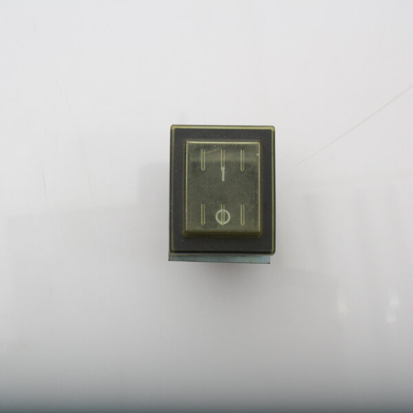 A close-up of a ProLuxe On/Off switch with a square black button.