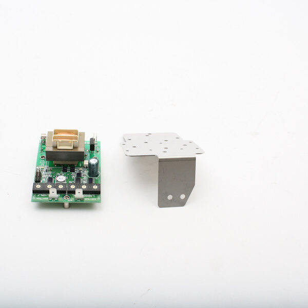 A small green circuit board with silver metal corners.