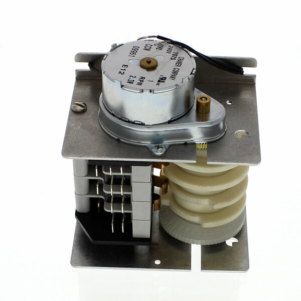 A Jackson 5945-303-31-00 timer with metal housing.