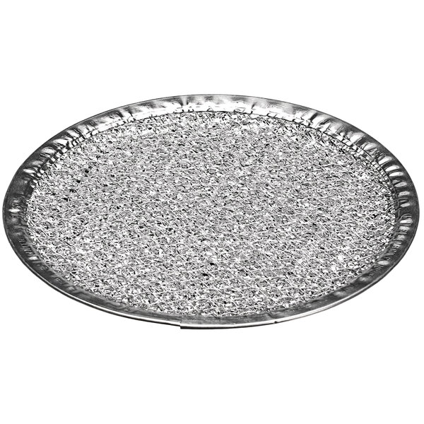 A round silver air filter with a textured surface.