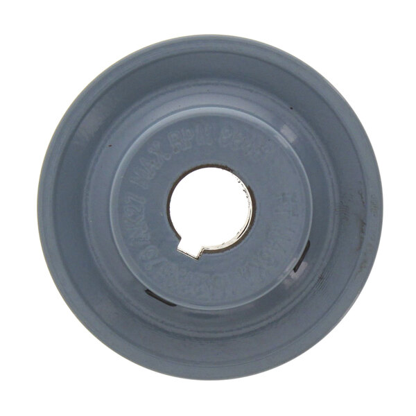 A grey circular Champion sheave with a hole in the middle.