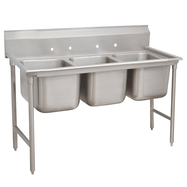 A stainless steel Advance Tabco three compartment sink with two bowls and a drain.