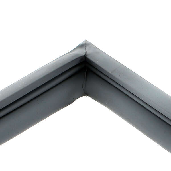 A gray corner piece for a Silver King refrigerator door gasket.