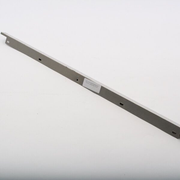A metal bar with a white label.