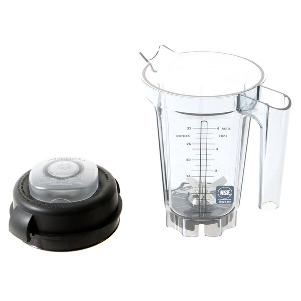 A Vitamix clear plastic container assembly with a black lid and handle.