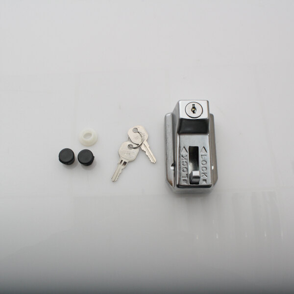 A Norlake lock assembly with keys on a white surface.