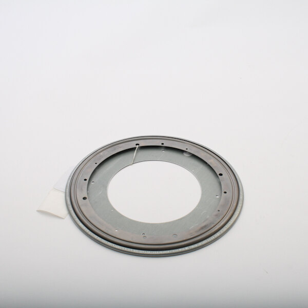 A circular metal ring with a white strip