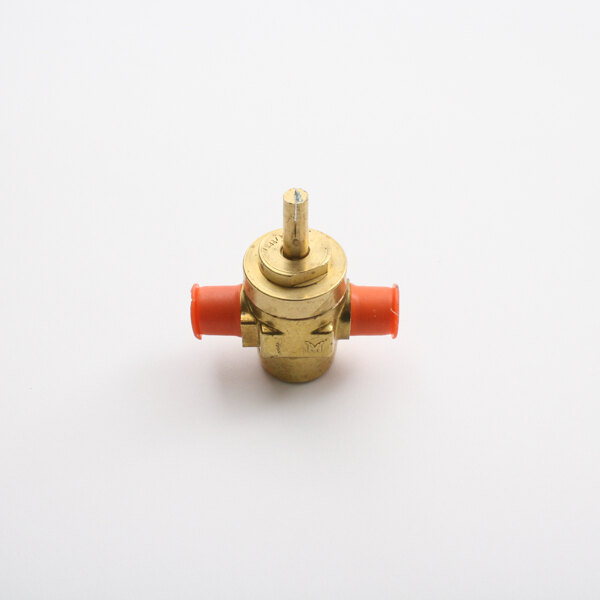 A close-up of a brass Southbend burner valve with orange tips.
