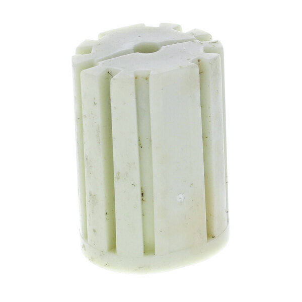 A white plastic cylinder with holes.