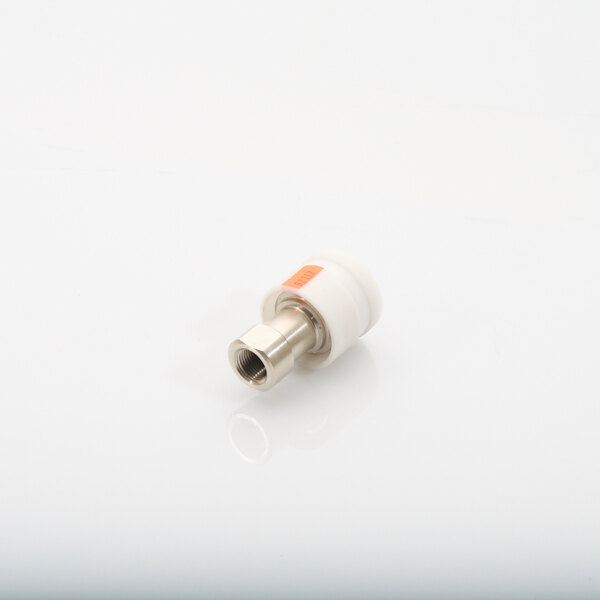 A white plastic cylinder with a metal nut.