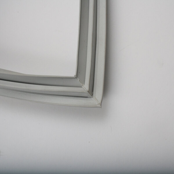 The corner of a white Perlick refrigeration gasket.