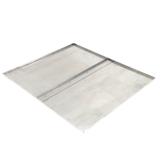 A stainless steel Montague burner baffle with metal plates on two sides.