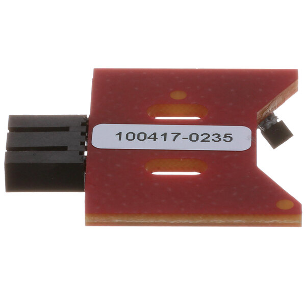 A red and black rectangular Middleby Marshall sensor with a white label.