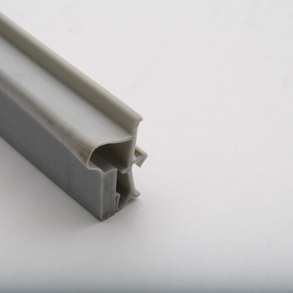 A close-up of a grey plastic strip.