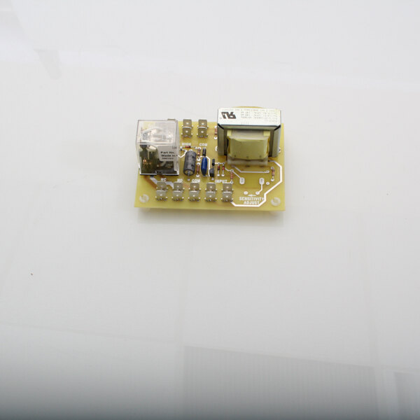 A yellow circuit board with the Jackson Lwco W Relay on it.