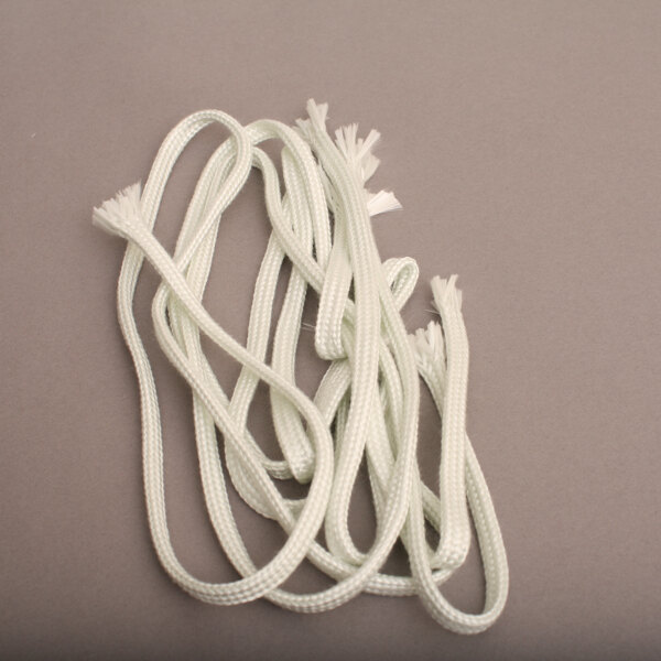 A white Montague insulation tubing rope with tassels.