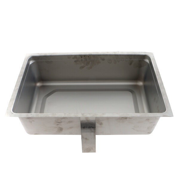 A stainless steel Delfield hot food well assembly with a metal handle on a white counter.