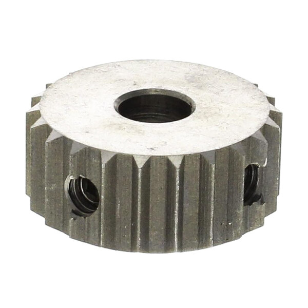 A metal sprocket with holes in it.
